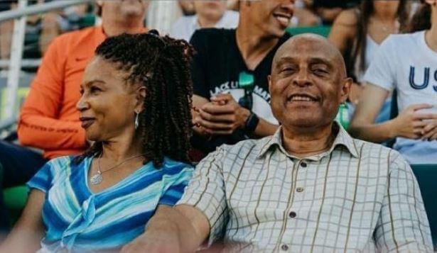 Marlean Felix with her husband during her daughter match.
